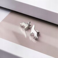 Srebrne kolczyki z motywem wilka - pr.925