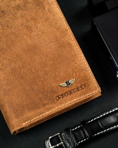 skórzany portfel męski z kieszonką na suwak - peterson na Arena.pl