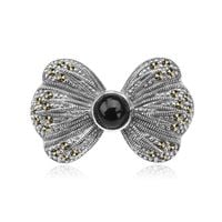 srebrna broszka kokarda z onyksem i markazytami