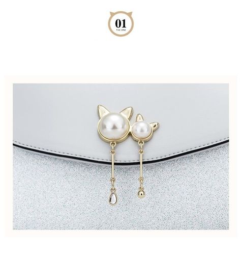 NUCELLE Kuferek perłowy kot na Arena.pl