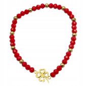Bransoletka z czerwonych koralików z przekładką koniczyna w kolorze złotym