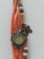 Zegarek na rękę retro pomarańczowy ozdobny pasek