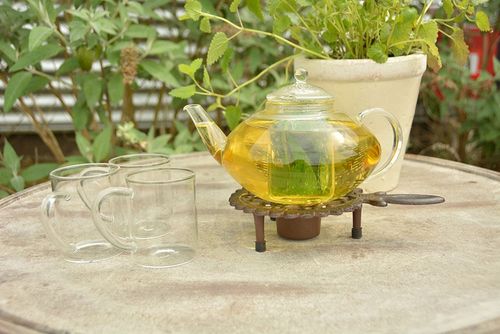 Podgrzewacz posiłków okrągły, żeliwny z uchwytem na Arena.pl