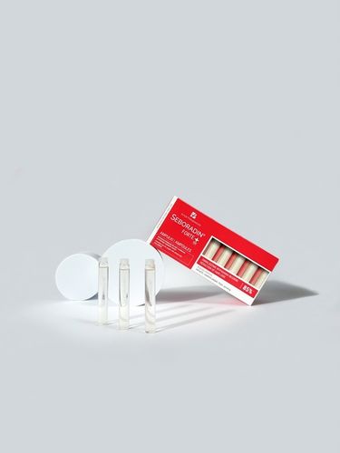 Kuracja przeciw wypadaniu włosów Seboradin FORTE 14 x 5,5 ml na Arena.pl