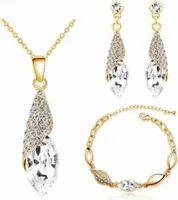 Złoty komplet biżuterii migdały z białymi cyrkoniami kryształowe złocony