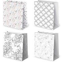 torebki ozdobne 10szt.  td set 114 białe 11,2 x 14 x 6,4 cm.