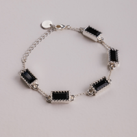 BRANSOLETKA Z CZARNĄ CYRKONIĄ POSREBRZANA LUMINOIR (B25/VIC/01AG)