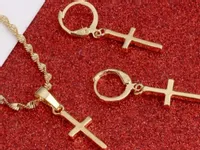 Złoty komplet biżuterii w kształcie krzyżyków