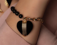 bransoletka z onyksów z sercem z kolekcji heart harmony (b23/zim/29au)