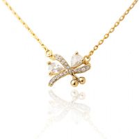 naszyjnik stal szlachetna pozłacana 14k złotem, kokardka cyrkonie nst2221