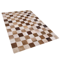 Dywan skórzany 140 x 200 cm brązowo-beżowy SOLMAZ