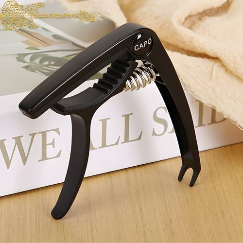 Kapodaster do gitary klasycznej czarny na Arena.pl