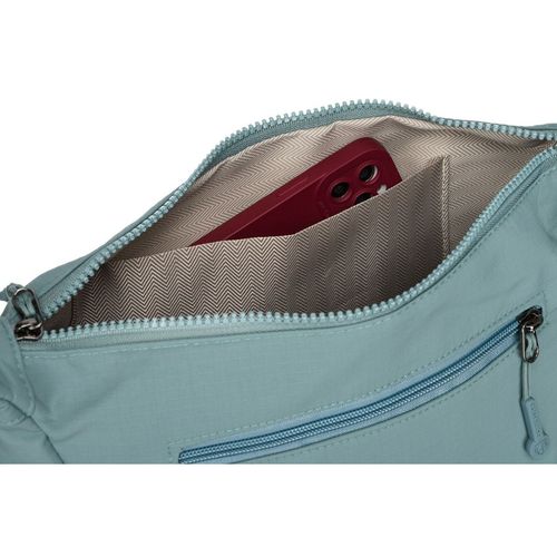 niebieska torebka damska z poliestru z kieszenią zamykaną na suwak na Arena.pl