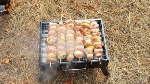 GRILL TURYSTYCZNY PRZENOŚNY SKŁADANY WĘGLOWY KEMPINGOWY METALOWY WALIZKA na Arena.pl