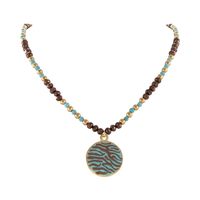 naszyjnik z czekoladowych koralików, turkusów i złotych kuleczek