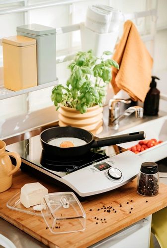 KUCHENKA INDUKCYJNA JEDNOPALNIKOWA PŁYTA GRZEWCZA SZKLANA 2000W TIMER LCD na Arena.pl