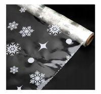 Folia celofanowa świąteczna do pakownia prezentów w śnieżynki 40 cm x 30 m