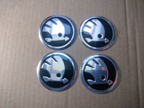 Naklejki emblemat na kołpaki dekielki koła skoda 56 mm aluminium 4 szt NOWE na Arena.pl