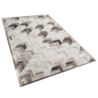 Dywan skórzany 140 x 200 cm szaro-beżowy ARSUZ