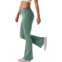 Legginsy dzwony damskie spodnie do jogi wysoki stan zielone fitness L