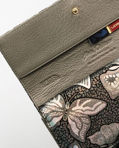 duży, skórzany portfel damski na zatrzask i bigiel - peterson na Arena.pl