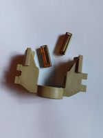 Szczotkotrzymacz podkaszarki do trawy