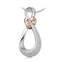 złoty wisiorek z brylantami w kształcie serca i nieskończoności