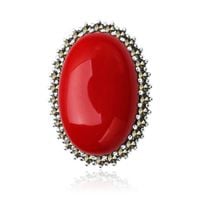 broszka srebrna owalna z koralem i markazytami