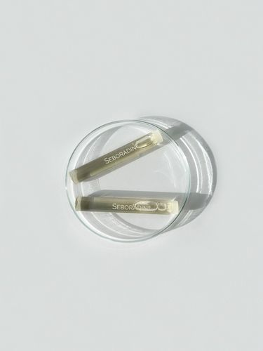 Kuracja przeciw wypadaniu włosów Seboradin FORTE 14 x 5,5 ml na Arena.pl