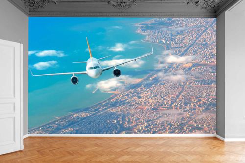 Fototapeta SAMOLOT W CHMURACH LECĄCY 370x250 na Arena.pl