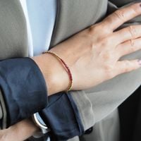 Bransoletka urodzeniowa styczeń - granat, złoty hematyt i srebro złocone