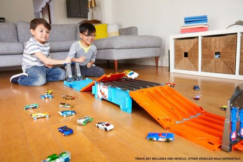 HOT WHEELS TRACK BUILDER MEGA TOR + 2 AUTA FTH77 na Arena.pl