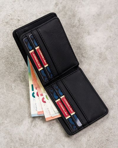 Portfel męski ze skóry eko Peterson z ochroną RFID STOP na gotówkę karty na Arena.pl