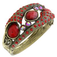 Metalowa sztywna bransoletka czerwone kamienie