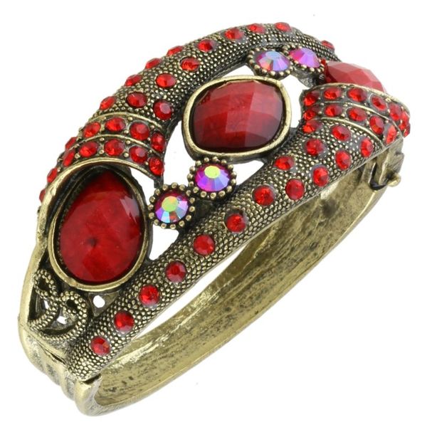 Metalowa sztywna bransoletka czerwone kamienie zdjęcie 1
