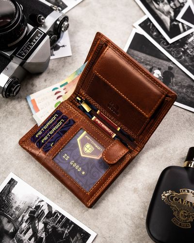 duży, skórzany portfel męski z wytłoczonym znakiem zodiaku - peterson na Arena.pl