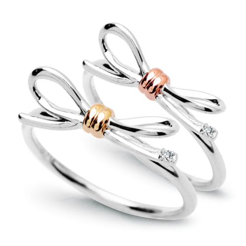 pierścionek - kokardka z białego złota z diamencikiem na Arena.pl