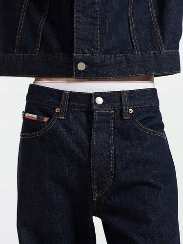 CALVIN KLEIN GRANATOWE JEANSY KIESZENIE (W36L34) na Arena.pl