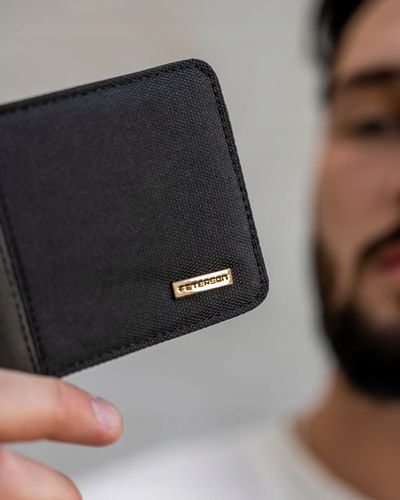 Portfel męski ze skóry eko Peterson z ochroną RFID STOP na gotówkę karty na Arena.pl