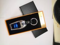 Stylowy cyfrowy brelok FORD z wbudowaną zapalniczką żarową.