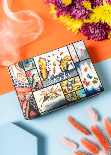 portfel damski zamykany na zatrzask w pomarańczowym kolorze - rovicky na Arena.pl