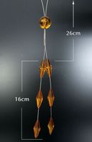 U1Upinacz dekoracyjny do firan pomarańczowe kryształki