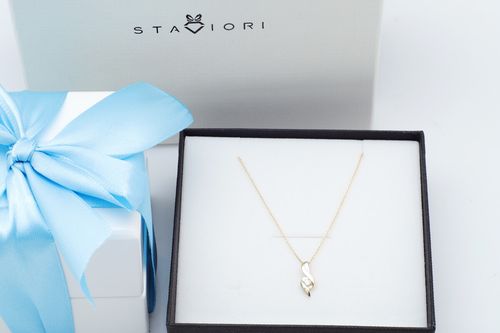 wisiorek przeplatany z żółtego złota z diamentem na Arena.pl