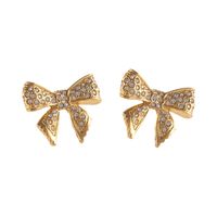 kolczyki kokardki z kryształkami aria princess collection (p25/nut/09au)