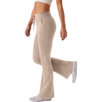 Legginsy dzwony damskie spodnie do jogi wysoki stan beżowe sportowe M