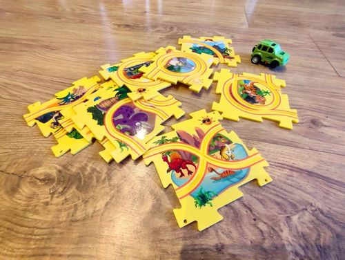 TOR SAMOCHODOWY KREATYWNE PUZZLE DINOZAUR PARK AUTKO 15 el. PUZZLE RAIL CAR na Arena.pl