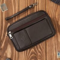 saszetka męska skórzana do ręki z miejscem na telefon