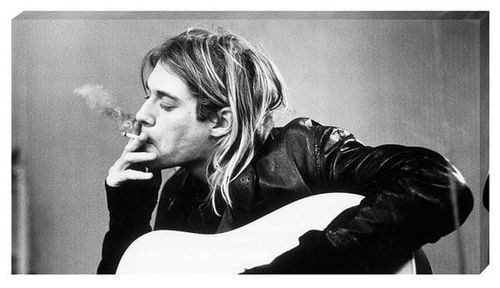 Nirvana Kurt Cobain z gitarą - obraz na płótnie 55x30 cm na Arena.pl