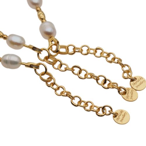 Naszyjnik - Białe Perły hodowane, hematyt, zawieszka słońce i srebro złocone na Arena.pl