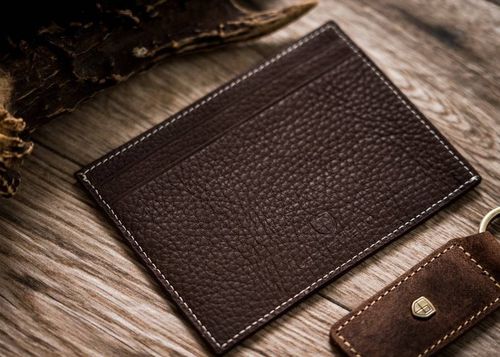 Skórzane etui na dokumenty i banknoty na Arena.pl